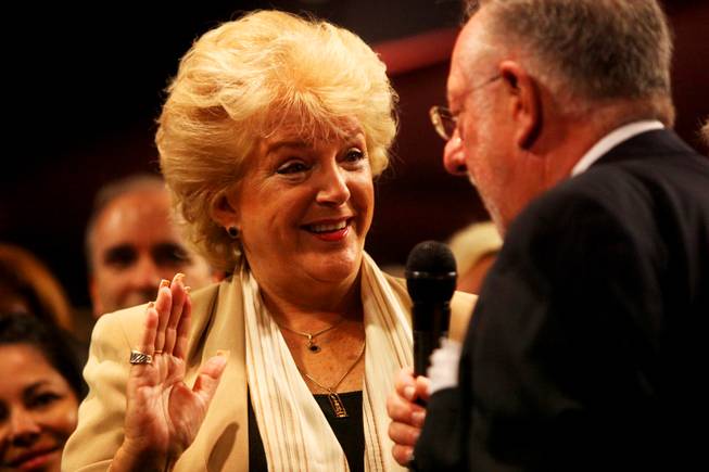 Oscar Goodman swears in his wife, Carolyn Goodman, as the new Mayor of Las Vegas during the City Council meeting Wednesday, July 6, 2011.