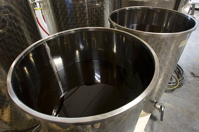 Vats of "Rumskey" base are shown at the Las Vegas Distillery in Henderson July 7, 2011. Rumskey is made with fermented sugar cane juice and whiskey mash double copper-stilled and aged together in oak barrels.