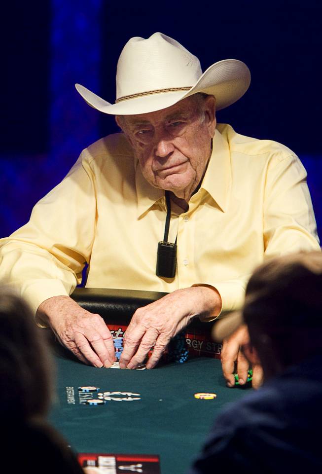 Poker professional Doyle Brunson competes during the first day of the World Series of Poker main event at the Rio Thursday, July 7, 2011. Brunson is the first two-time World Series of Poker main event champion to win consecutively - in 1976 and 1977. 