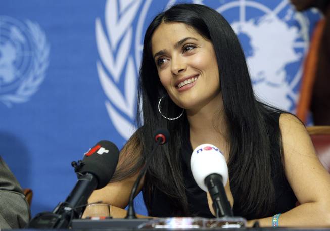 Mexican actress Salma Hayek, producer and Pampers spokeswoman for the global Pampers/UNICEF campaign "One Pack = One Vaccine" smiles during a news briefing about the UNICEF press conference to announce the partnership between UNICEF and Procter & Gamble aimed at eliminating maternal and newborn tetanus at the United Nations building in Geneva, Switzerland, Thursday, Oct. 2, 2008.