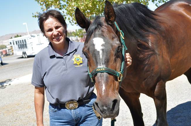 Las Vegas Metro Mounted Police Officer Kelly Korb and mounted police horse, Nokona. 