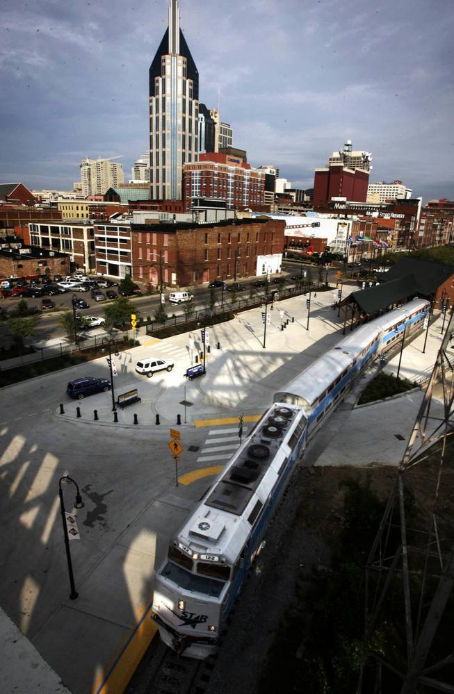 The Music City Star pulls into the Riverfront station in downtown Nashville, Tenn., on the opening day of the new commuter rail service running from Lebanon, Tenn. to downtown Nashville, Tenn., Monday, Sept. 18, 2006.