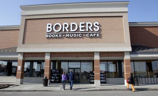 Customers walk into a Borders Books & Music store, in Ann Arbor, Mich. Borders Group filed for bankruptcy Monday, July 18, 2011, after seeking court approval to liquidate its 399 stores when the company failed to receive any bids that would keep the 40-year-old chain in operation.