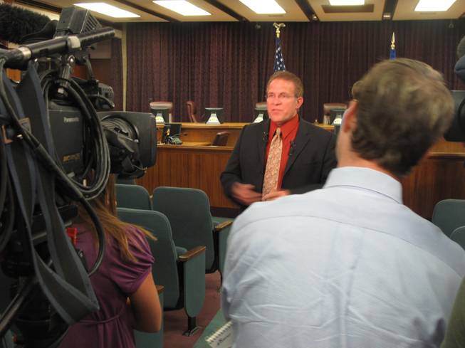 New North Las Vegas City Councilman Wade Wagner speaks with the media after his swearing in ceremony Monday night at city hall.