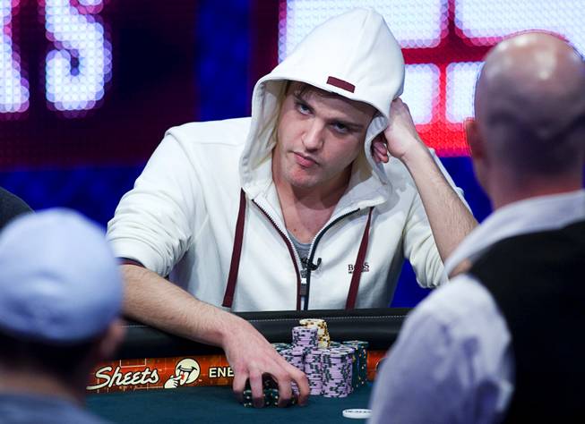 Pius Heinz of Germany competes during Day 8 of the World Series of Poker $10,000 buy-in, no-limit Texas Hold 'em main event at the Rio Tuesday, July 19, 2011.