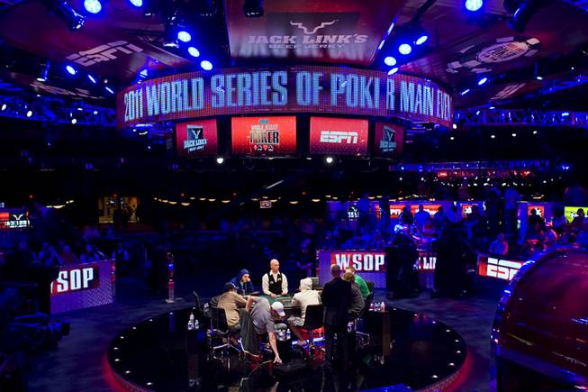 Players compete at the main stage during Day 8 of the World Series of Poker $10,000 buy-in, no-limit Texas Hold 'em Main Event at the Rio on Tuesday, July 19, 2011.