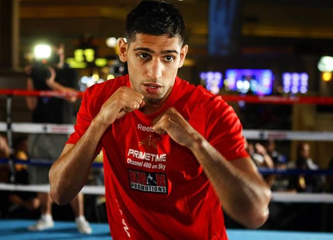 WBA super lightweight champion Amir Khan of Britain shadow boxes during a media workout at the Mandalay Bay Wednesday, July 20, 2011. Khan will defend his title against IBF junior welterweight champion Zab Judah of New Yorkat the Mandalay Bay Events Center Saturday.