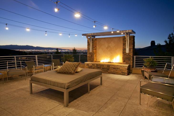 The residence at 641 Saint Croix St., Henderson, features a deck with an outdoor fireplace and a view of the Las Vegas Strip. It sold for $3.2 million in October 2012.