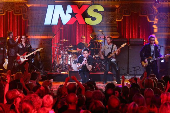 J.D. Fortune, center, performs with the band INXS Tuesday, Sept. 20, 2005, in Los Angeles. Fortune, a Toronto-based musician originally from New Glasgow, Nova Scotia, was chosen Tuesday, Sept. 20, 2005, as the new lead singer for INXS during the season finale of CBS' "Rock Star: INXS" in Los Angeles.