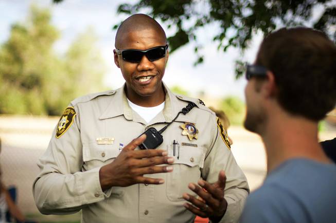 Metro Officer Charleston Hartfield is shown at community event at Molasky Family Park in Las Vegas, Aug. 2, 2011. Hartfield was killed when a gunman opened fire at a country music festival in Las Vegas on Oct. 1, 2017. 