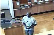 Surveillance photos of a suspect involved in a bank robbery on South Maryland Parkway. 