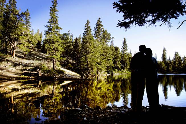 Mark Blais and Nicole Tassone of Las Vegas enjoy Teresa Lake after sunrise at Great Basin National Park on Sunday, August 7, 2011.
