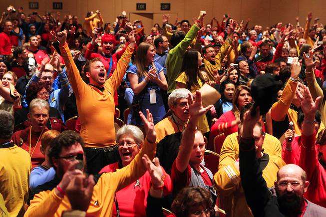 Convention attendees celebrate setting a new record for the largest gathering of people dressed as Star Trek characters at the annual Las Vegas Star Trek convention Saturday, August 13, 2011 at the Rio. Convention attendees nearly doubled the record, setting a new mark of 1040 people in costume.