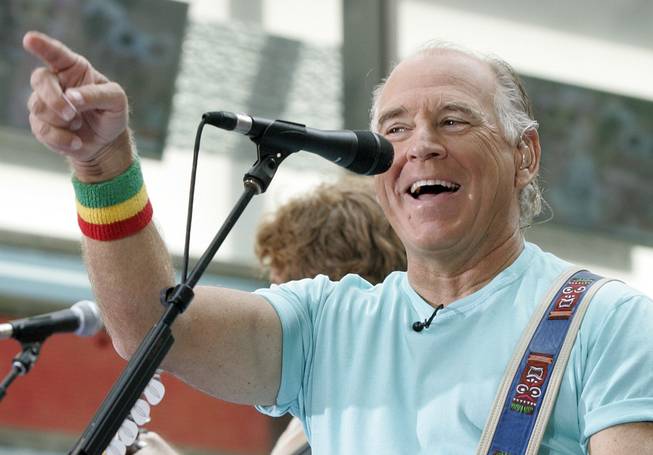 Jimmy Buffett performs with his Coral Reefer Band on the NBC "Today" television program in New York's Rockefeller Center, May 26, 2006. 
