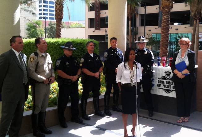 Darlene Adams speaks about the dangers of driving under the influence of prescription drugs at a kickoff press conference outside the Clark County Detention Center for the annual Labor Day impaired driver enforcement effort.