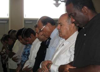 The men of the mosque of the Islamic Society of Nevada pray the daily afternoon prayer on Friday Aug.19.