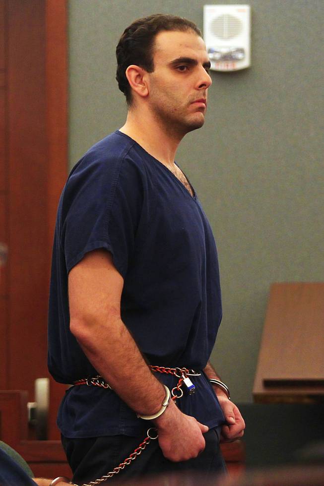 Anthony Carleo, also known as the "Bellagio Bandit," stands as he is sentenced for his robbery of the Suncoast by Judge Michael Villani Thursday, Aug. 25, 2011. 