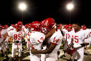 Arbor View High football players celebrate a 47-26 victory over Liberty Friday, August 26, 2011.