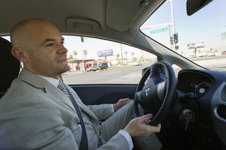 Las Vegas Sun columnist Patrick Coolican drives an all-electric Mitsubishi 