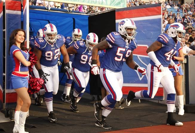 The Buffalo Bills take the field before the start of an NFL preseason football game against the Jacksonville Jaguars in Orchard Park, N.Y., Saturday, Aug. 27, 2011.