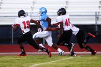Centennial running back Jacobi Owens gets a big gain against the  Las Vegas defense for a touchdown during their game Friday, September 2, 2011 at Centennial High School. .  Las Vegas came from behind for a 24-21 win.