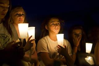 Friends of Christina Portaro gather for a vigil at a park by Faith Lutheran High School on Sunday, Sept. 4, 2011. Portaro, a junior at Faith Lutheran, was killed Saturday in an ATV accident in Utah.