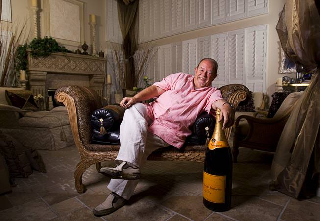 Robin Leach poses at his home in Las Vegas Wednesday, Sept. 7, 2011.
