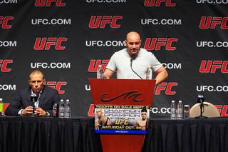 Georges St. Pierre and Dana White take part in a news conference to announce the card for UFC 137 on Wednesday, Sept. 7, 2011, at Mandalay Bay Events Center. Nick Diaz was slated to face St. Pierre but was pulled from the fight and replaced with Carlos Condit due to multiple failed media appearances, missed company flights and general disappearance.