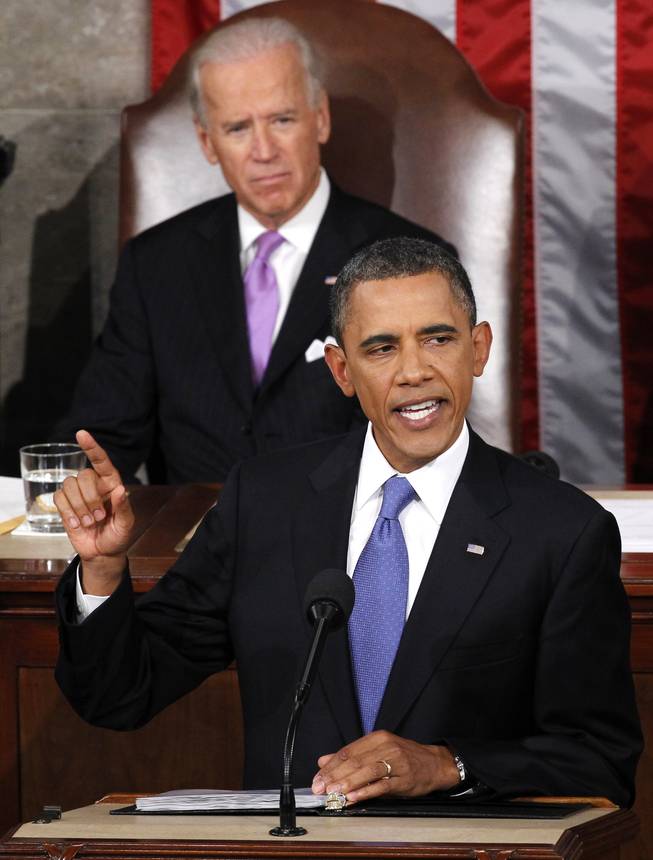 President Barack Obama speaks to a joint session of Congress at the Capitol in Washington, Thursday, Sept. 8, 2011 as Vice President Joe Biden watches.