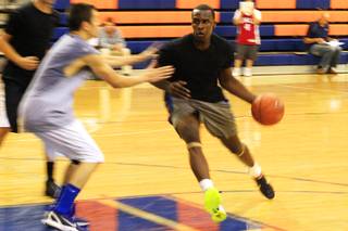 Shabazz Muhammad drives to the basket during Bishop Gorman's first basketball practice of the season Saturday, September 10, 2011.