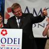 Republican Mark Amodei speaks at a victory party in Reno on Tuesday after defeating Democrat Kate Marshall in a special election for Nevada's 2nd Congressional District. Amodei's daughters Erin, left, and Ryanne were among the supporters on hand. 