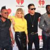 The Black Eyed Peas -- Will.i.am, Fergie, Taboo and Apl.De.Ap -- at the iHeartRadio Music Festival at MGM Grand Garden Arena on Sept. 23, 2011. On New Year's Eve, Fergie will host the grand opening of 1 OAK Nightclub at the Mirage, while Will.i.am will spin at Surrender at two of the many Las Vegas NYE celeb-studded parties.