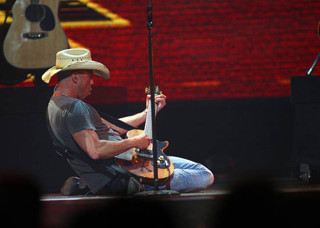 Kenny Chesney performs during the second night of the iHeartRadio Music Festival at MGM Grand Garden Arena on Saturday, Sept. 24, 2011. The festival marks the official launch of iHeartRadio, Clear Channel's free digital radio product combining more than 800 broadcast radio and digital-only stations from 150 cities.