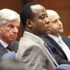 Conrad Murray listens to the prosecution's opening arguments in his involuntary manslaughter trial at Superior Court, Tuesday, Sept. 27, 2011 in Los Angeles.  Murray has pleaded not guilty and  faces four years in prison and the loss of his medical license if convicted of involuntary manslaughter in Michael Jackson's death. 