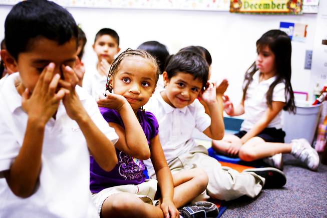 Gabriela Pace, center, and her fellow kindergartners have daydreaming time at Elizondo Elementary School in North Las Vegas on Sept. 29, 2011. Elizondo became an EdisonLearning-run campus in July 2011 as part of the district's efforts to improve the struggling school. 