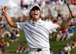 Las Vegas resident Kevin Na celebrates on the 18th hole after winning the Justin Timberlake Shriners Hospitals for Children Open at TPC Summerlin on Sunday, Oct. 2, 2011.