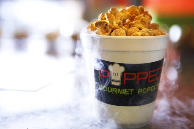 Frozen caramel popcorn is made with liquid nitrogen at Popped, ...