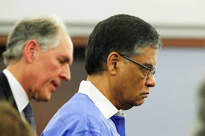 Dr. Dipak Desai leaves court after a competency proceeding Tuesday, Oct. 11, 2011.