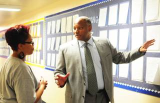 Clark County Schools Superintendent Dwight Jones shares an idea with Principal Amber Brookins at Jacobson Elementary School on Wednesday, Oct. 12, 2011. Jones said he hopes to take formal, one-hour tours at more than 50 schools by the end of the school year.