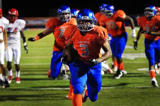 Bishop Gorman running back Shaquille Powell charges into the end zone during their game against Arbor View Friday, October 21, 2011. Gorman won their homecoming game 56-7.