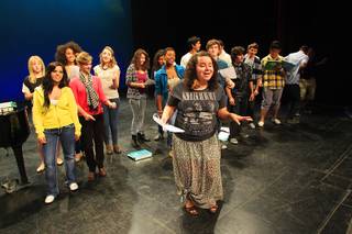 Brittany McKay solos as Las Vegas Academy choral students rehearse  for an upcoming contest sponsored by the television show Glee Tuesday, Oct. 25, 2011.