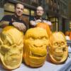 Pumpkin artists Ray Villafane and Andy Bergholtz pose during a pumpkin-carving exhibition in the Grand Canal Shoppes at the Venetian on Wednesday, Oct. 26, 2011. The pumpkins will be displayed at Heidi Klum's Halloween party and other Halloween events at Tao and Lavo.
