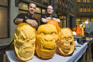 Pumpkin artists Ray Villafane and Andy Bergholtz pose during a pumpkin-carving exhibition in the Grand Canal Shoppes at the Venetian on Wednesday, Oct. 26, 2011. The pumpkins will be displayed at Heidi Klum's Halloween party and other Halloween events at Tao and Lavo.