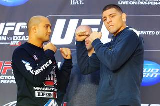 B.J. Penn and Nick Diaz face off during a news conference in advance of UFC 137 Thursday, Oct. 27, 2011.
