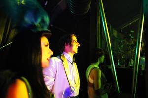 Melody Sweets and the Gazillionaire watch "Absinthe" from the side stage at Caesars Palace on Friday, Oct. 28, 2011.