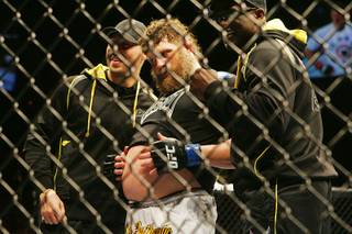 Roy Nelson rubs his belly after defeating Mirko 