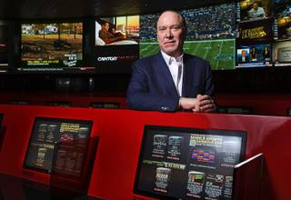 Lee Amaitis, CEO of Cantor Gaming, poses in the remodeled race and sports book in the Venetian on Tuesday, Nov. 1, 2011. The sports book reopened after a three-month, multimillion-dollar renovation.