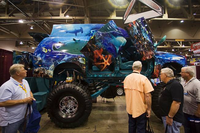 The DingMaster Seascursion (based on a 2000 Ford Excursion) is displayed at the Zoops booth during the Specialty Equipment Market Association (SEMA) trade show at the Las Vegas Convention Center Tuesday Nov. 1, 2011. The automotive trade show, not open to the public, is expected to attract over 115,000 people. The show, part of Automotive Aftermarket Industry Week (AAIW), runs through Friday.
