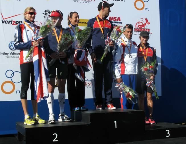The first-, second- and third-place male and female winners of the 2011 ITU Long Distance World Championship accept their medals on Nov. 5, 2011. Jordan Rapp from the United States and Rachel Joyce from Great Britain are the world champions.