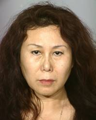 Jing Qu, 55, of Flushing, N.Y., was arrested in connection with performing illegal surgical procedures.